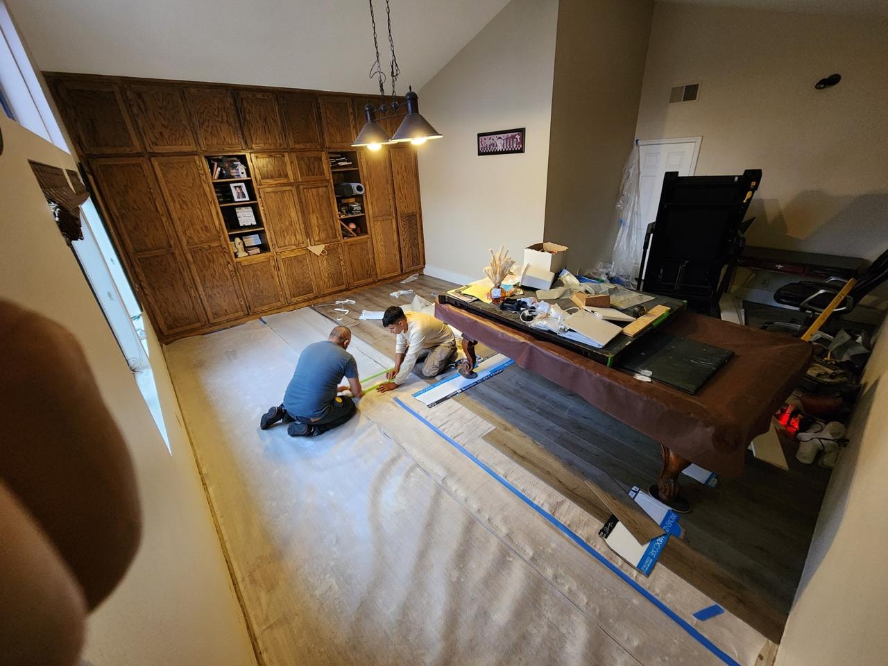 LVP Installation — Living Room with Built-Ins