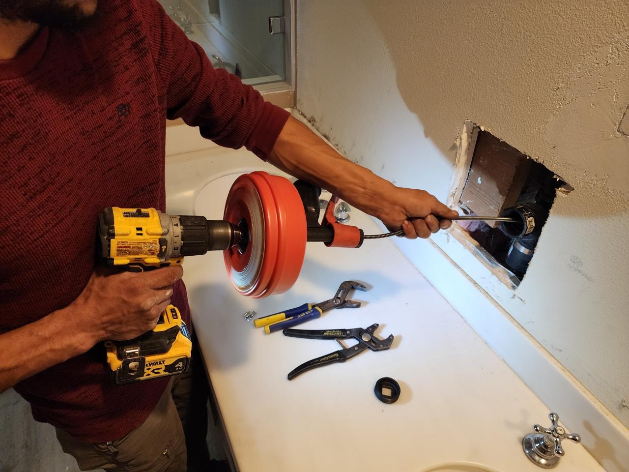 Drain Cleaning — Bathroom Sink Snake